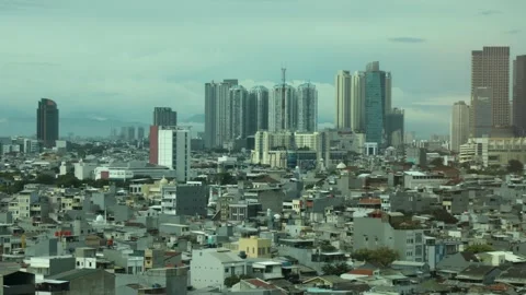 View of a city in a developing country from the top of a high-rise building Stock Footage 334636783