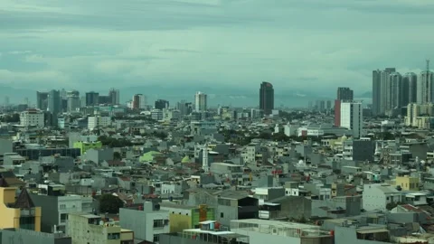 View of a city in a developing country from the top of a high-rise building Stock Footage 334636785