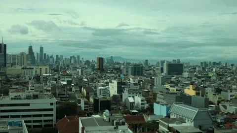 View of a city in a developing country from the top of a high-rise building Stock Footage 334636787
