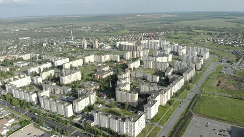 View of the city from a high point. Modern buildings. Green landscape on the Stock Footage 116048015