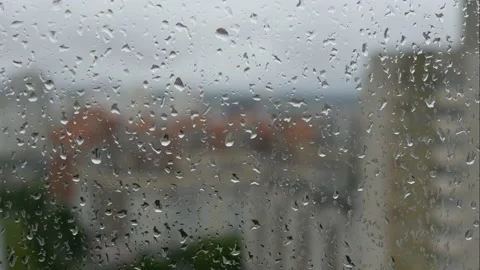 View of the city, it's raining. Drops on glass. Stock Footage 197270739