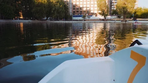View of the city lake from the double white catamaran Stock Footage 112043944