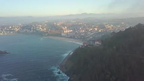 A view of a city with a mountain in the background Stock Footage 155594706