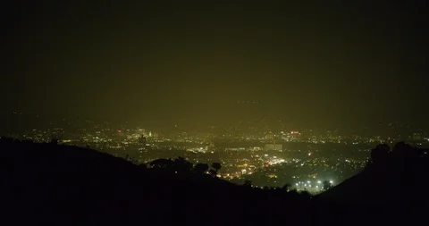 View of the city at night from Kenneth Hahn Park in Los Angeles, California Stock Footage 115084285