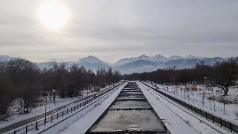 View from city river on Almaty mountains (Zailiyskiy Alatau). Stock Footage 223872053
