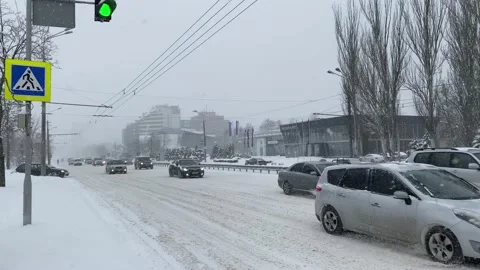 View of city road during snowfall in the city Stock Footage 236707730