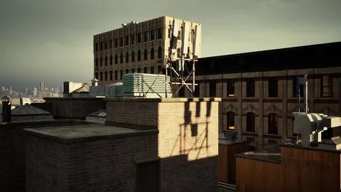A view of a city from a rooftop of a building Ilustración de archivo