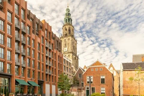View at a city square in front of the Martinitoren church tower in Groninge.. Stock Photos