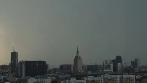 View of city Storm, dramatic sky filled with dark storm clouds Video stock 313788272