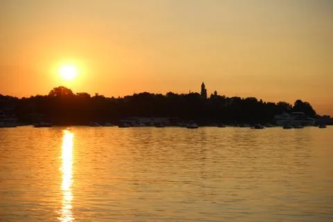 View on the city in the sunset. Stock Photos
