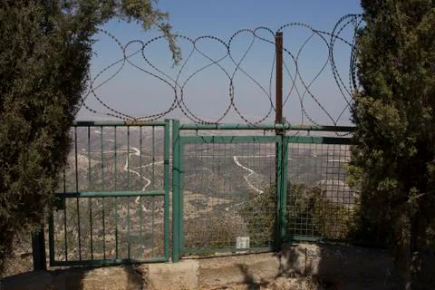 View of the city through barbed wire Stock Photos