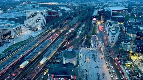 View of City Transport Network at Dusk With Busy Roads and Trains in Motion in Stock Footage 329237322