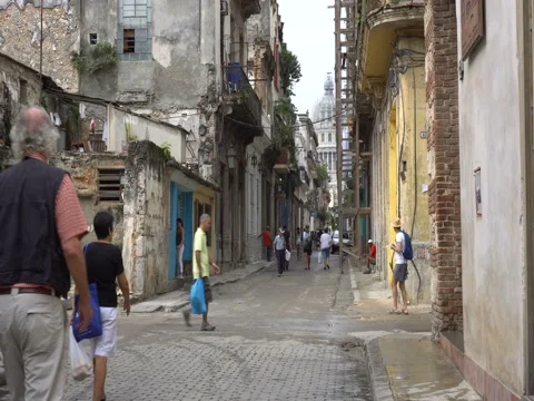 View to cityscape of central street Old colonial Havana. Ruined ragged house in Stock Footage 70854881