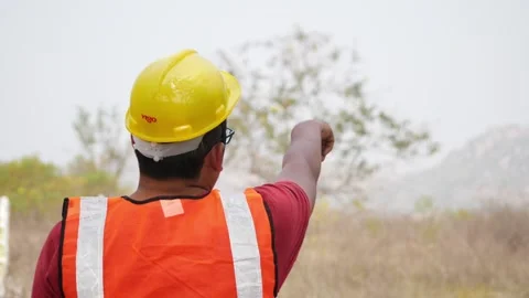View of civil engineer indicating something with hand Stock Footage 147706973