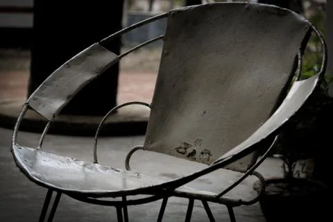 View of a Classic model of steel chair on the rooftop with the blury background Stock Photos