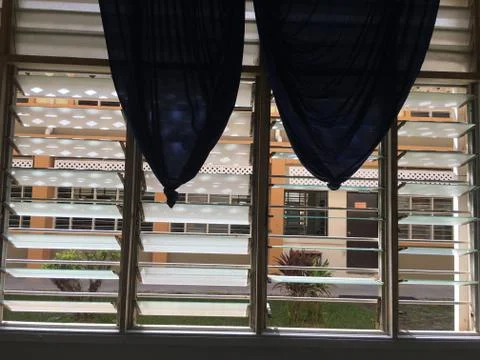 View in the classroom. windows open and there is light on windows. Stock Photos
