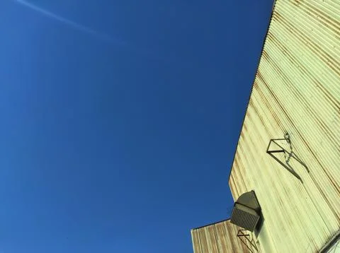 View of the clear sky from the side of the building Stock Photos