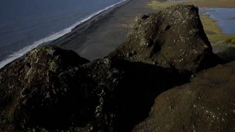 View from the cliff. Birds soar over a cliff. Cape Dyrholaey Stock Footage 130451302