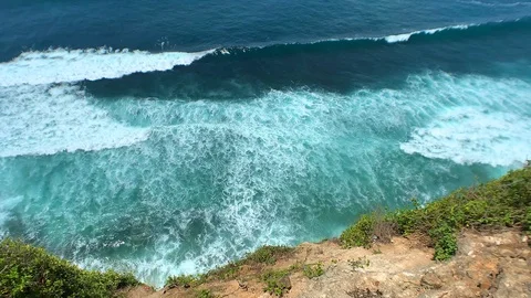 View from the cliff on foaming waves. Blue waves of the ocean. Stock Footage 122126679