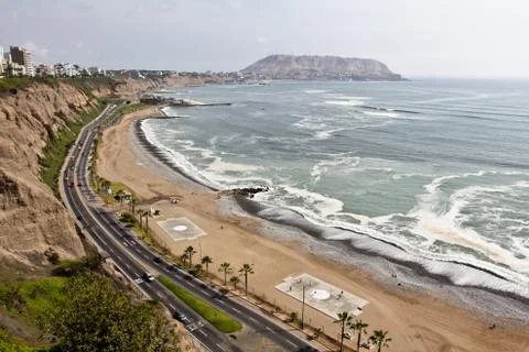 View from the cliff in Lima. One side with buildings and hotels, the other side  Stock Photos