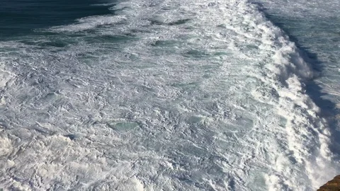 View from cliff of massive ocean waves Video stock 120014061