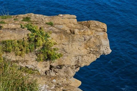 View of the cliff from the observation deck of the Cabo Mayor lighthouse in t Stock Photos
