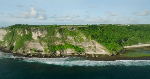 View from cliff of ocean, sky meets liquid horizon in natural landscape Видео 270560367