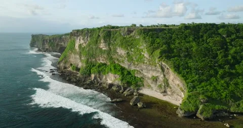 View from cliff of ocean, sky meets liquid horizon in natural landscape Видео 270794543