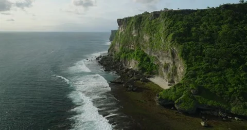 View from cliff of ocean, sky meets liquid horizon in natural landscape 動画素材 271075463