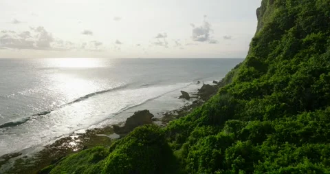 View from cliff of ocean, sky meets liquid horizon in natural landscape Stock Footage 271315194