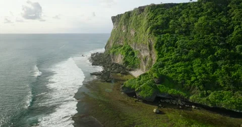 View from cliff of ocean, sky meets liquid horizon in natural landscape Stockbeeldmateriaal 272321892