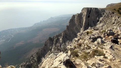 View on cliffs, abys and fsouthern coast of Crimea rom top of Mount Ai-Petri. Stock Footage 106800028