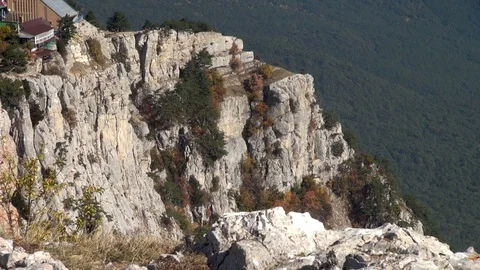 View of cliffs with end station cable car from top of Mount Ai-Petri. Stock Footage 106800002