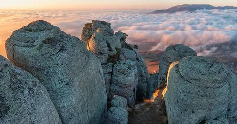 View from the cliffs of Mount Demerdzhi to the cloud-covered area Stock Photos