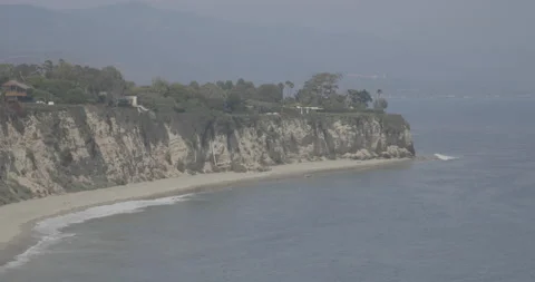 View of Cliffside Beach Homes in Pacific Palisades, CA Stock Footage 137149363