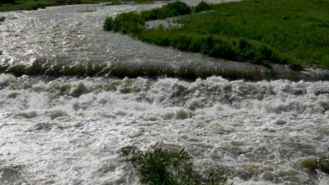 A view of climbing a mountain with a river full of water. Stock-Footage 159041785