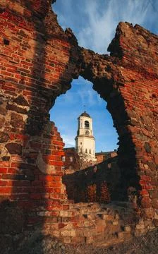 View of the Clock Tower from the ruins of the Old cathedral in the town of Stock-Fotos