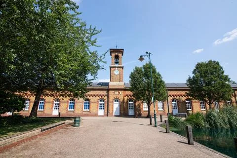 A view of the clock tower standing tall beside the RSA Island Centre Foto stock
