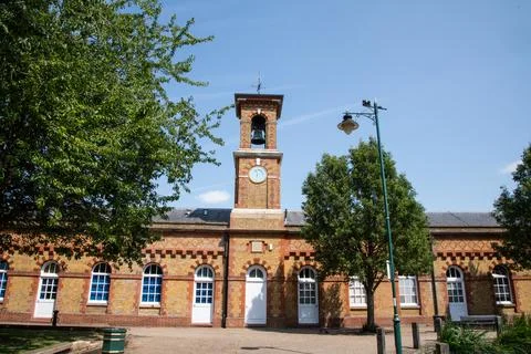 A view of the clock tower standing tall beside the RSA Island Centre Stock Photos