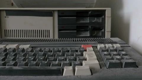 View of a close-up of inserting and removing an old-style 5.25" floppy disk Stock Footage 91299872