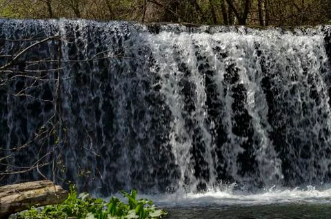 View closeup of waterfall part at cascade of river Bistritsa Stock Photos