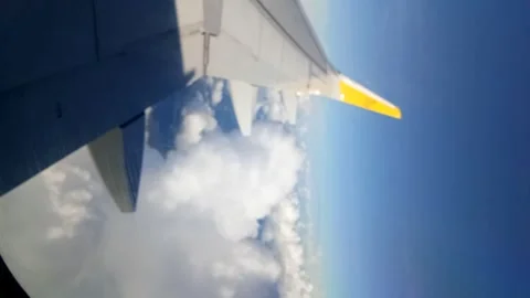 View of the clouds above the plane Stock Footage 241608286