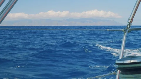 View of clouds above Tenerife. View from yacht sailing in strait between Stock-Footage 89997412