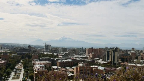 View of clouds above the Yerevan city with huge mountain ARARAT behind Video stock 82183090