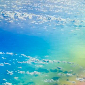 View of the clouds from the airplane in flight Stock Photos