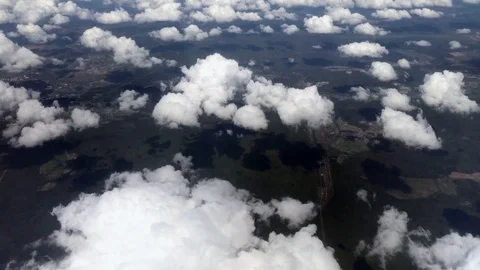View of the clouds from the airplane window Vidéo 76061416