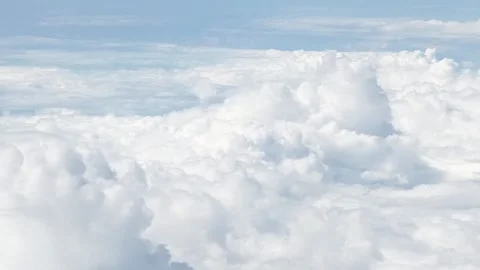 View of  Clouds From Airplane Window Stock Footage 218642477