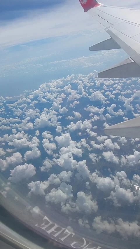 View of the clouds from the airplane window 動画素材 227555444