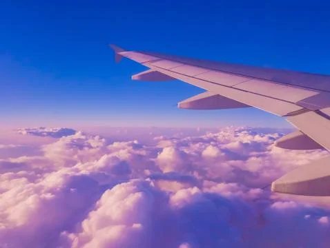 View of clouds from an airplane window. Stock Photos