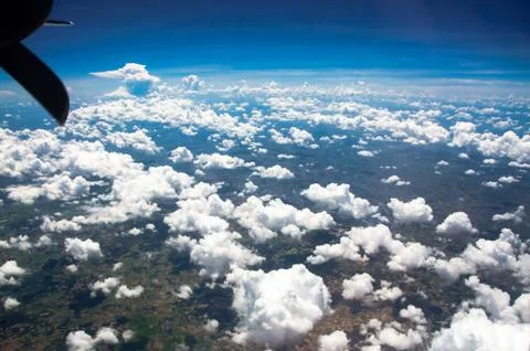 View of clouds from an airplane window. Stock Photos
